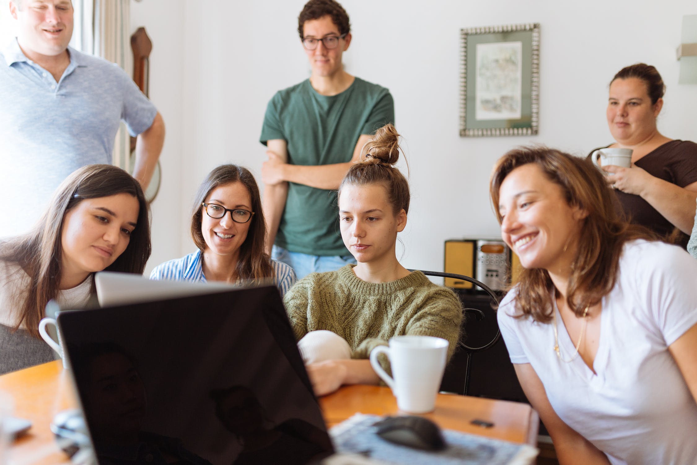 a group of students work together