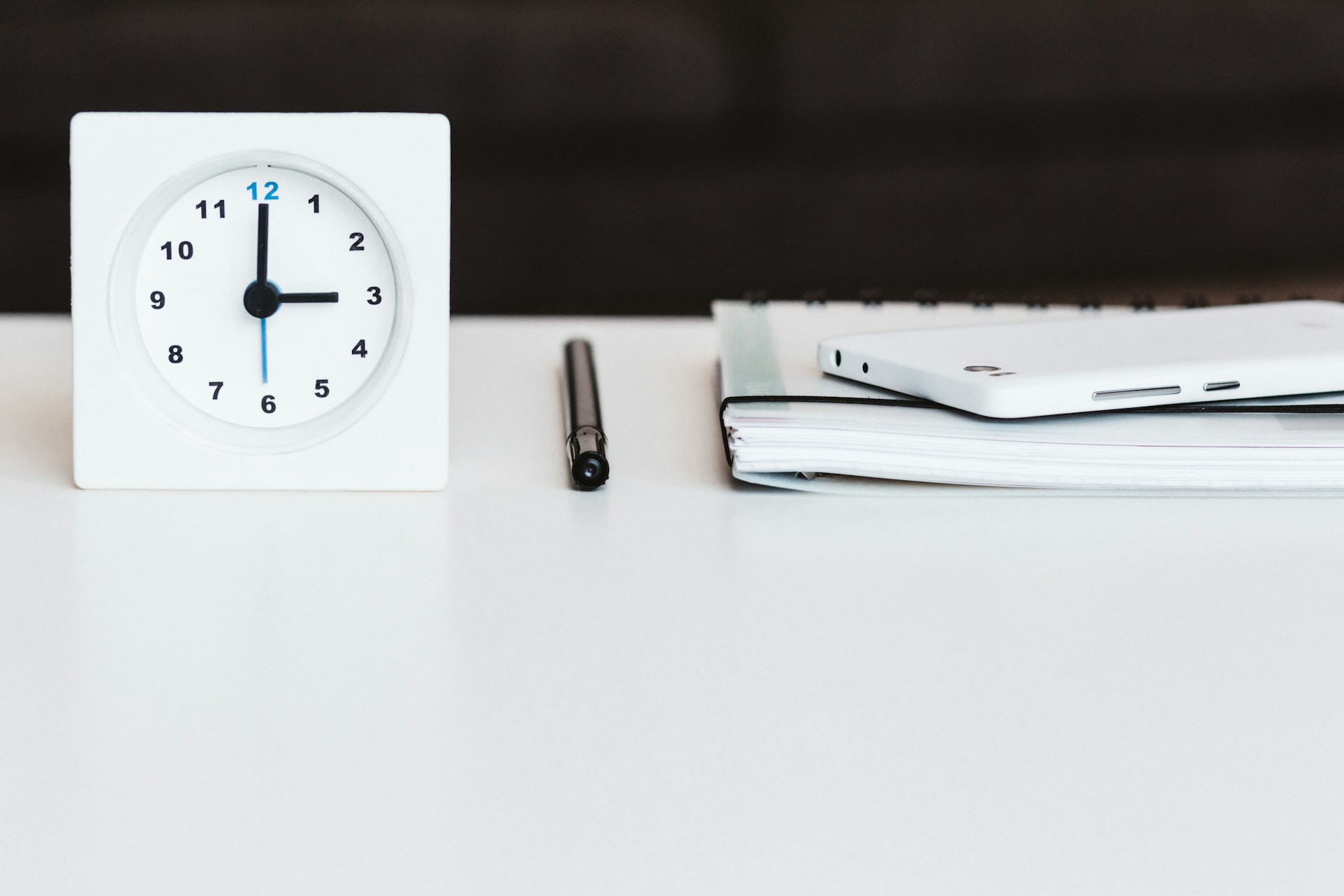 a clock and papers